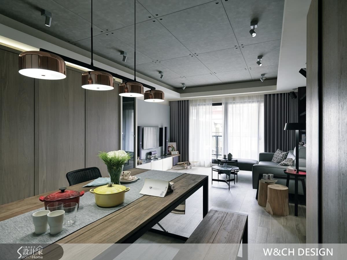 透過隱藏式設計，將玄關鞋櫃、收納櫃、廚房及臥室整併在木質造型牆後，兼顧機能同時降低畫面零碎感，創造空間質感與一致性。