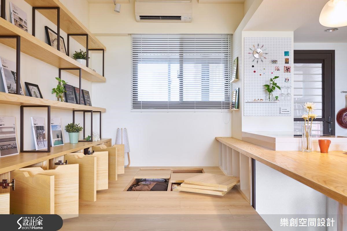 在廚房與多功能和室之間以吧台結合雙面電器櫃與長桌的設計，能大幅提升家人間的互動度，更方便家長對幼兒的照看。