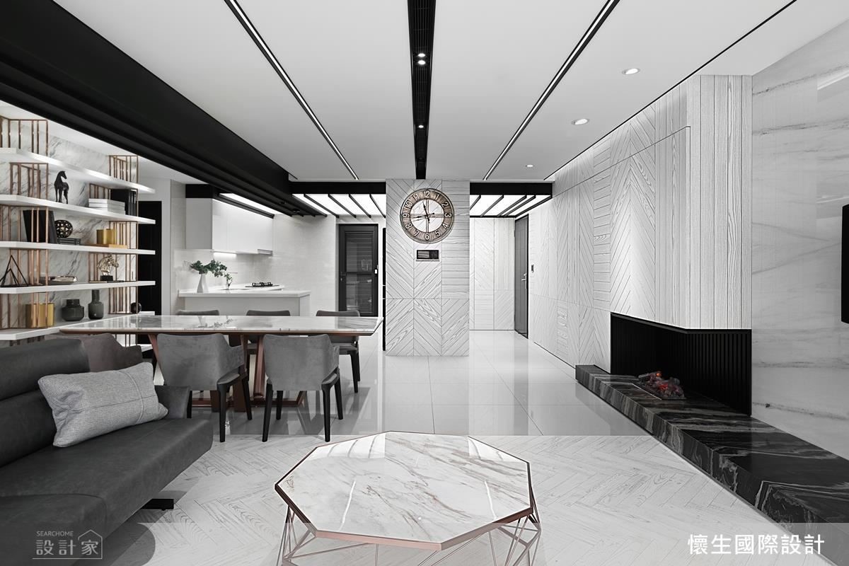 以大面木紋牆面點綴，調和冷硬黑白空間。