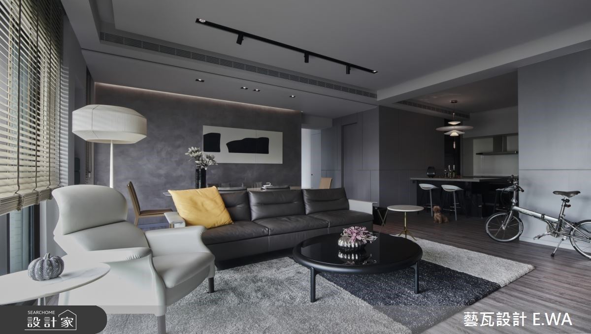 餐廳背牆選用義大利特殊漆營造手作質感的溫度，成為視覺焦點。