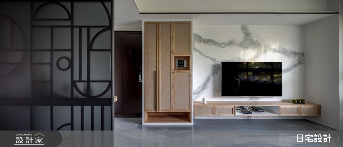 客廳藤編櫃體以新舊融合概念，詮釋空間獨特美學。